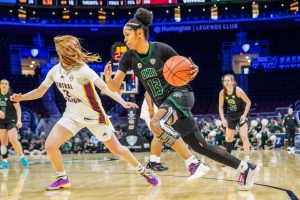 Ohio Women's Basketball guard Monica Williams driving into the paint against Central Michigan.
