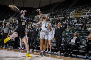 Ohio Women's Basketball guard Asiah Baxter attempting a corner three against UMBC.