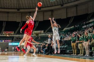 Ohio Women's Basketball guard Bailey Tabeling shooting a three against Miami. 