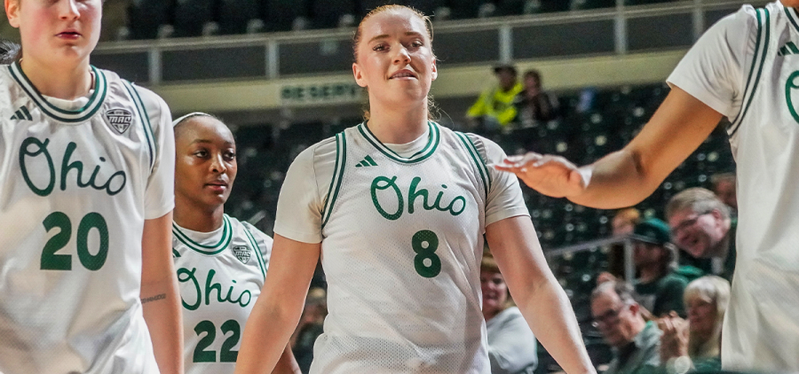 Ohio Women's Basketball forward Elli Garnett (8) walking into the Bobcats huddle vs Miami.