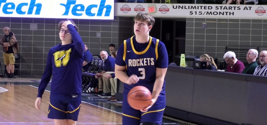 Wes Briggs warms up before his matchup against Chesapeake in the Convocation Center.