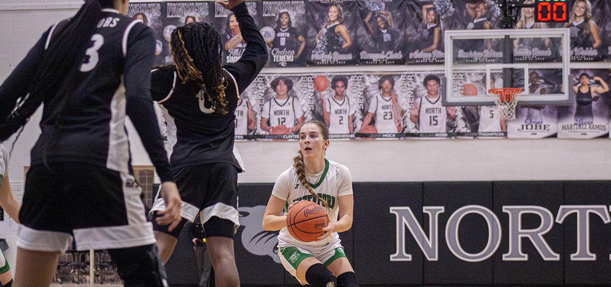 Brynlee Pottmeyer goes up for a three against Harvest Prep.