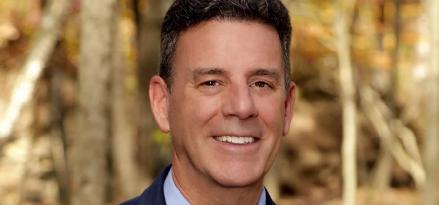 Dr. Philip Wagner poses for a smiling portrait.