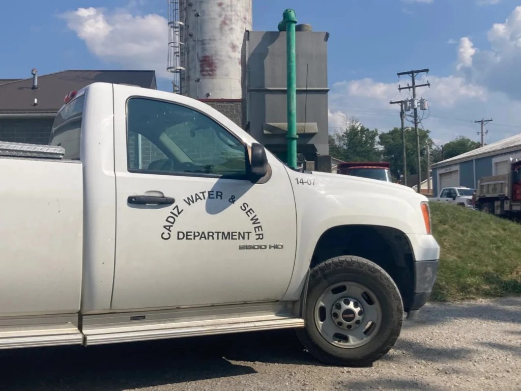 A white truck from the Cadiz Water and Sewer Department is parked in front of the water treatment plant.