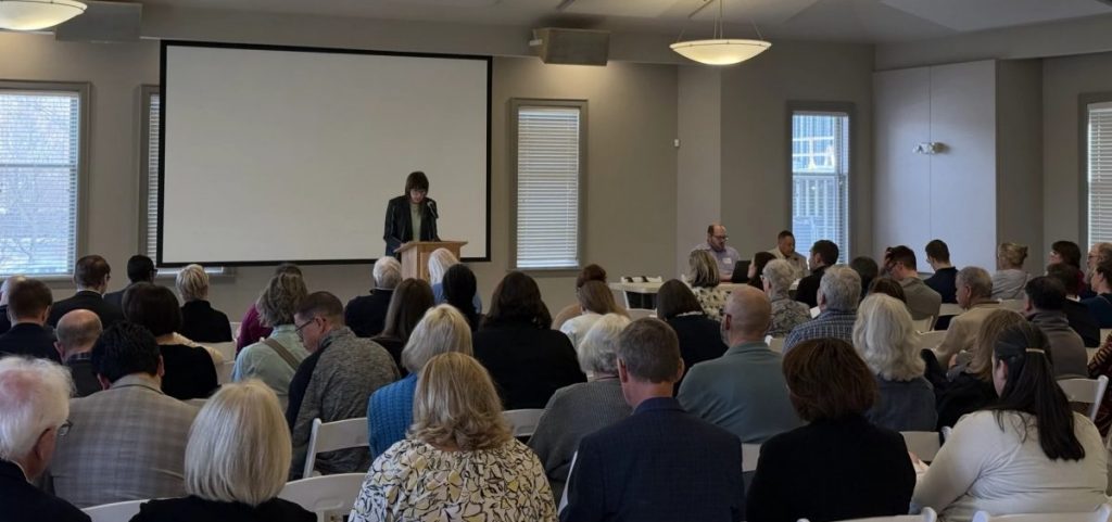 The Ohio Democratic Party's Executive Committee meet in a conference room.