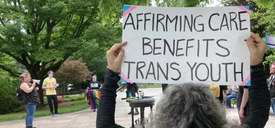 Demonstrators outside the Ohio Statehouse showing support for transgender kids
