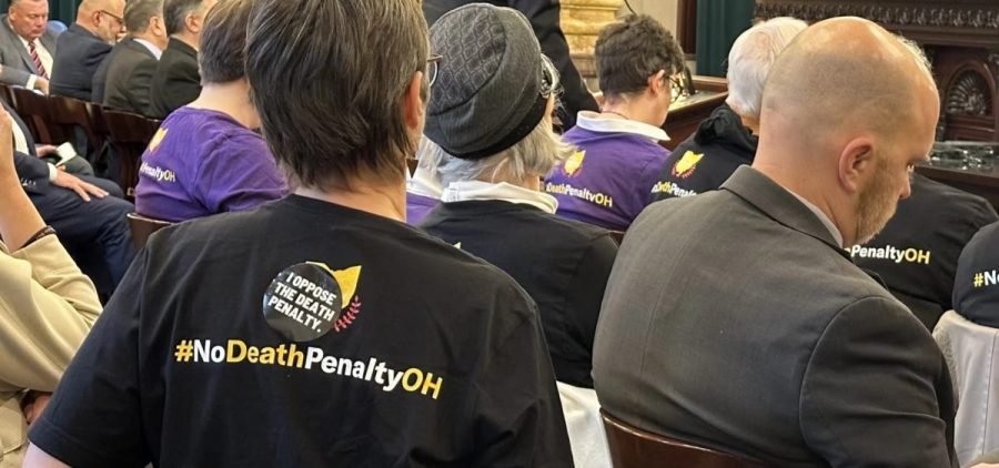 Senate Bill 101 backers wear shirts that say #NoDeathPenaltyOH in the Judiciary committee meeting.