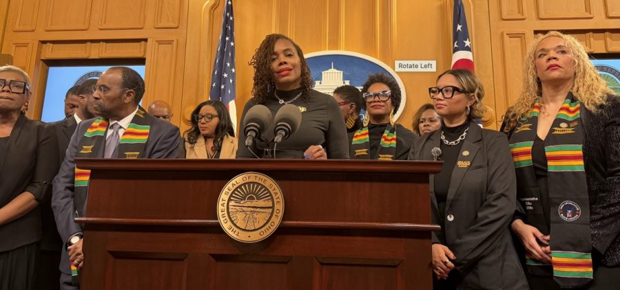 Ohio Black Legislative Caucus Foundation President Shayla Davis (at mic) speaks to the press at the Ohio Statehouse during Black History Month 2026