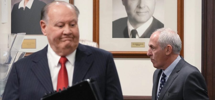 Defendants former FirstEnergy CEO Chuck Jones and ex-FirstEnergy Senior Vice President Michael Dowling enter the courtroom in Summit County Common Pleas Judge Susan Baker Ross’ courtroom