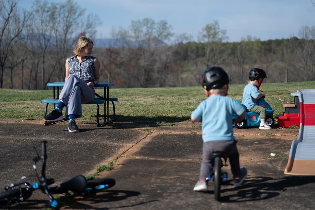 Helen Kaiser watches her sons play outside.