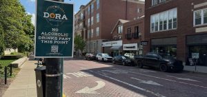 A sign on Court Street designating one of the DORA zone boundaries.