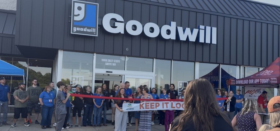 People gathered Thursday at the ribbon cutting ceremony for the new Goodwill store in Athens.