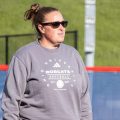 Jenna Hall stands on field at the 2026 MAC Tournament