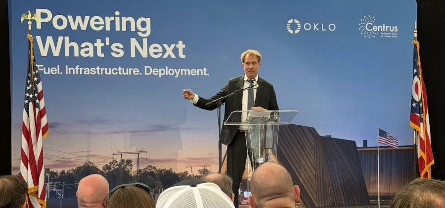 Oklo CEO Jacob DeWitte talks to a crowd gathered on the site of the former Portsmouth Gaseous Diffusion Plant in Pike County.