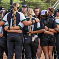 Ohio Softball team standing in a circle.