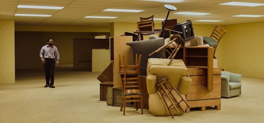 Chiwetel Ejiofor plays Clark, a furniture store owner who wanders into a mysterious storage space in Backrooms. A24