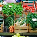 Fresh produce at a farmers market stall.