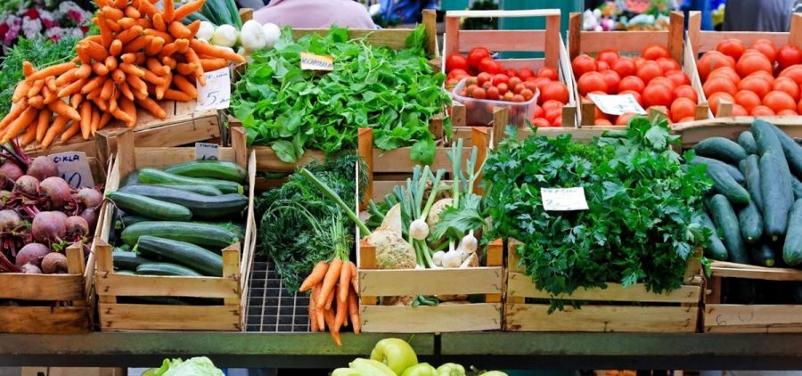 Fresh produce at a farmers market stall.