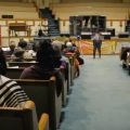 People gather in a church.