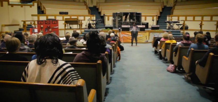 People gather in a church.