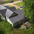 Police tape surrounds a home