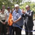 State and local officials attend a ribbon-cutting ceremony marking the completion of the 88-mile Baileys Trail System in southeast Ohio.