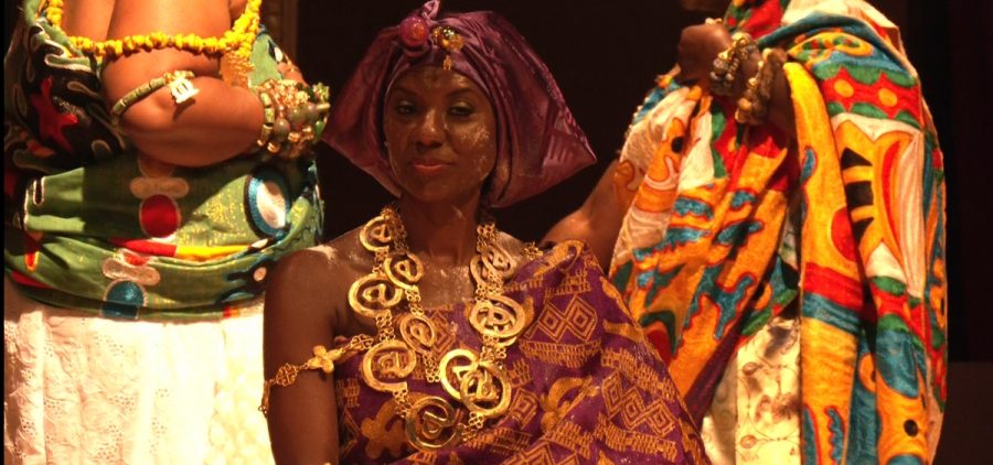 Janelle Coleman is dressed in traditional Ghanian clothing at a ceremony in Columbus.