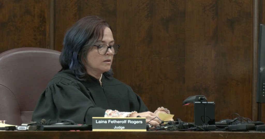 Vinton County Judge Laina Fetherolf Rogers looking over papers at the arraignment of Gary Siders Junior and Senior