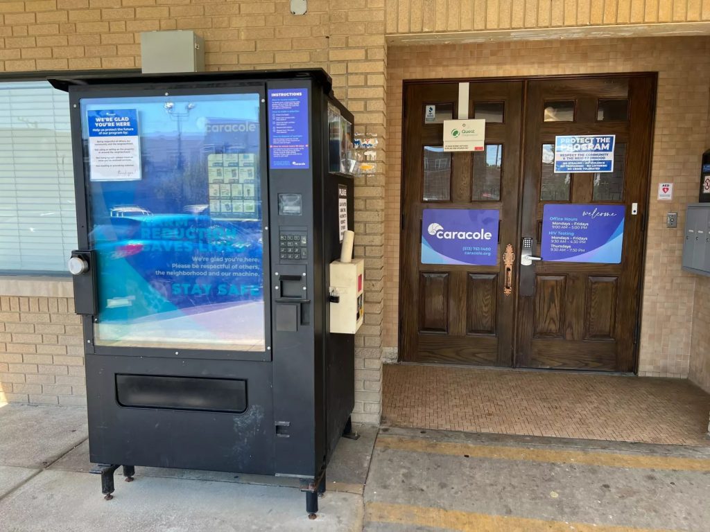 A vending machine with harm reduction supplies sit outside Caracole in Cincinnati.