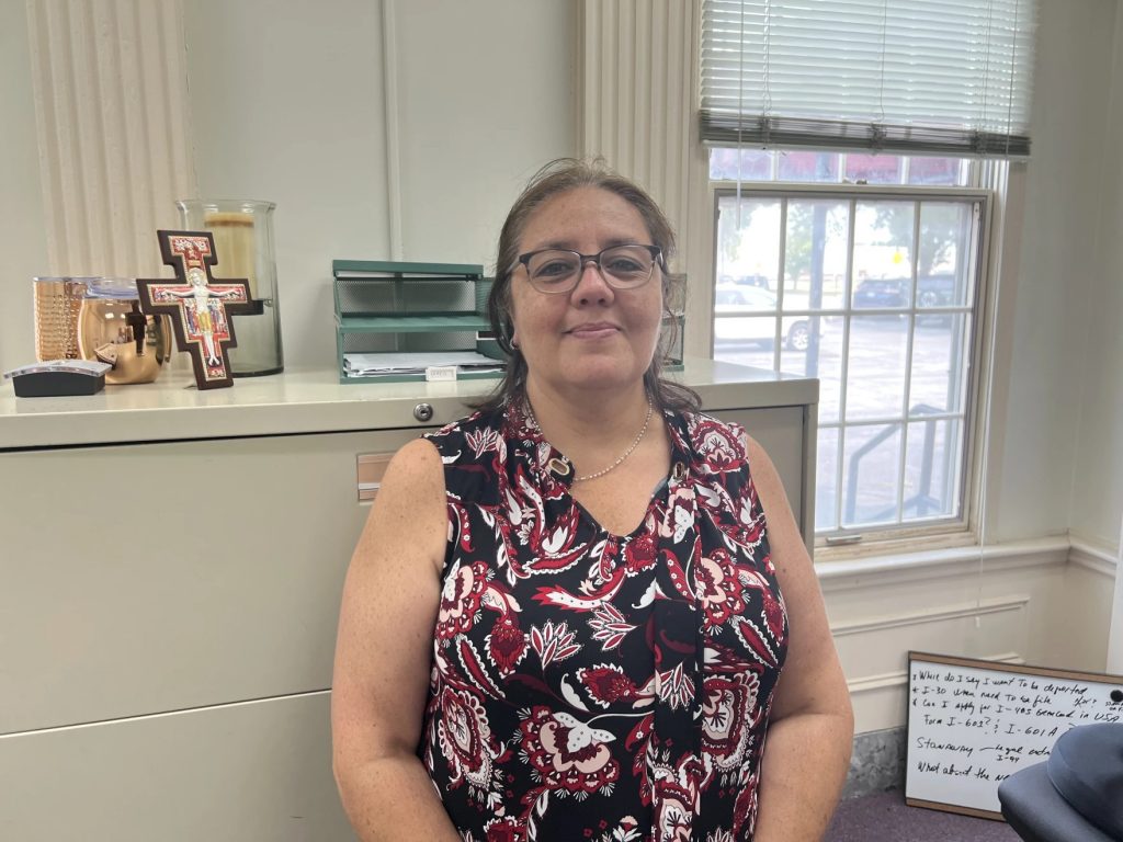 Angelica Buettner poses for a picture in her office.