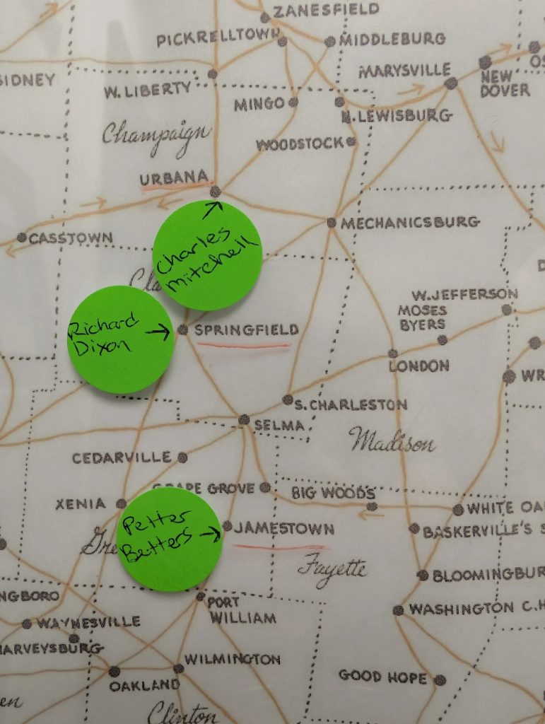 The temporary display uses a map with dots marking the location where each man was murdered.