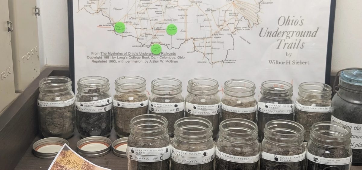The temporary display at the Underground Railroad Museum displays 14 jars, each filled with the dirt from a lynching site in Ohio.