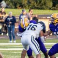 The Teays Valley defender tackles the Bloom-Carroll defender for a tackle for loss.