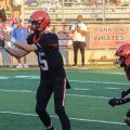 The Wheelersburg Pirates take the snap during their week one matchup against the Portsmouth Trojans.