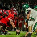 Waterford Wildcats and Caldwell Redskins face off before the snap of the ball with the Redskins on offense.