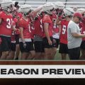 The Jackson Ironmen break the huddle during a summer practice.