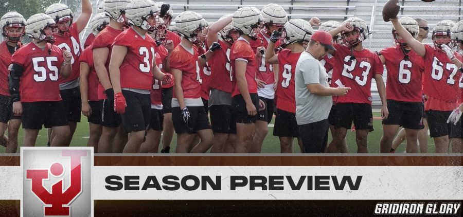 The Jackson Ironmen break the huddle during a summer practice.