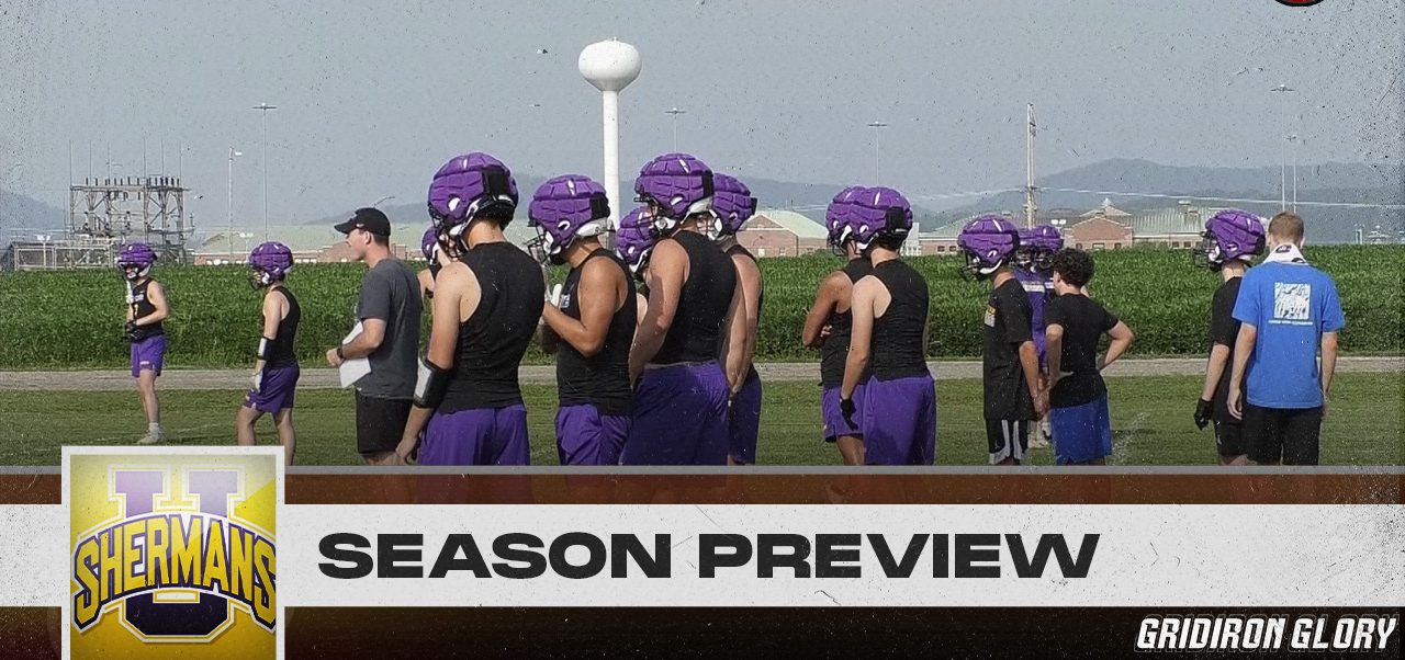 The Unioto Tanks players standing at practice.