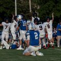 Washington Court House player sits on his knees after a heartbreaking play.