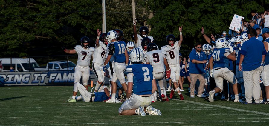Washington Court House player sits on his knees after a heartbreaking play.