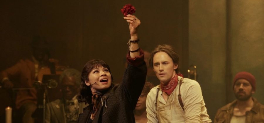 Eva Noblezaba and Reeve Carney in Hadestown: The Musical. Bleecker Street and LD Entertainment