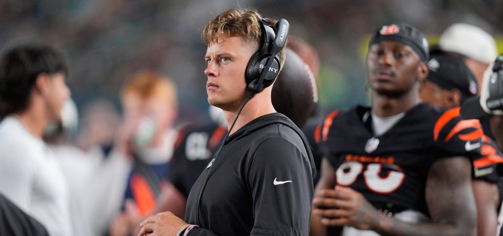 Cincinnati Bengals quarterback Joe Burrow watches action from the sidelines