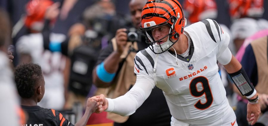 Cincinnati Bengals quarterback Joe Burrow greets fans before an NFL football game