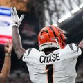 Cincinnati Bengals wide receiver Ja'marr Chase (1) celebrates after catching a pass for a touchdown from Joe Burrow.