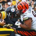 Cincinnati Bengals defensive tackle Dexter Lawrence II (97) grabs Pittsburgh Steelers quarterback Aaron Rodgers (8) by the jersey during the second half of an NFL football game
