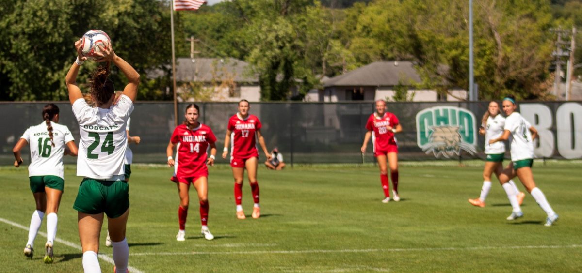 Ohio women's soccer player inbounds the ball against Indiana.
