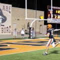 A Wheelersburg player throws up the peace sign as he crosses the goal line for a Pirates touchdown.