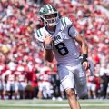Ohio football's Nick Poulos runs in a touchdown during their game against the Nebraska Cornhuskers.