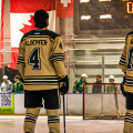 Ohio Hockey players standing for national anthem