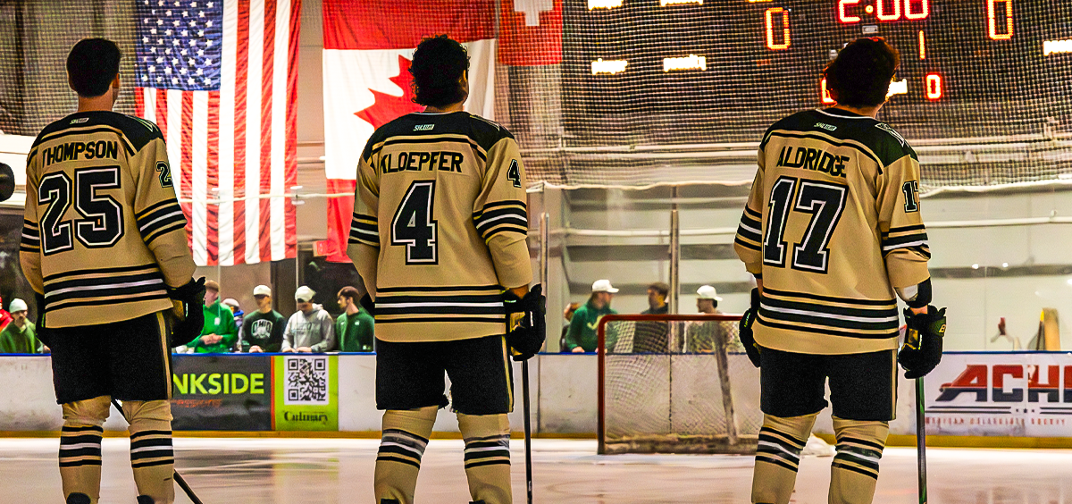 Ohio Hockey players standing for national anthem